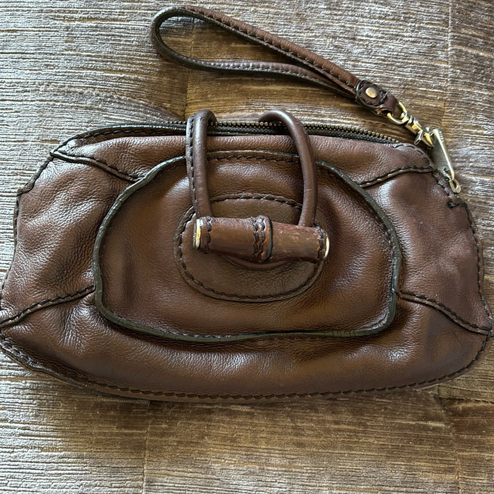 Fossil clutch in dark brown. Leather is soft from gently use